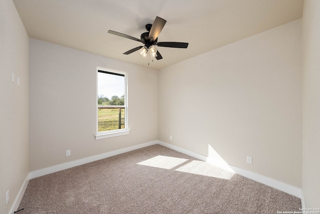 carpeted empty room with ceiling fan