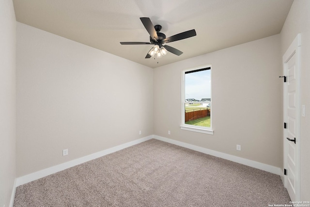 unfurnished room featuring carpet flooring and ceiling fan