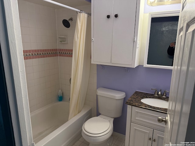 full bathroom featuring vanity, toilet, tile patterned flooring, and shower / bath combo with shower curtain