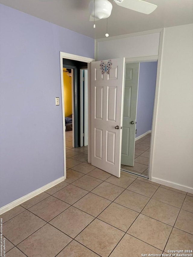 empty room featuring light tile patterned floors