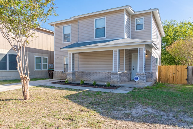 view of front of home featuring a front yard