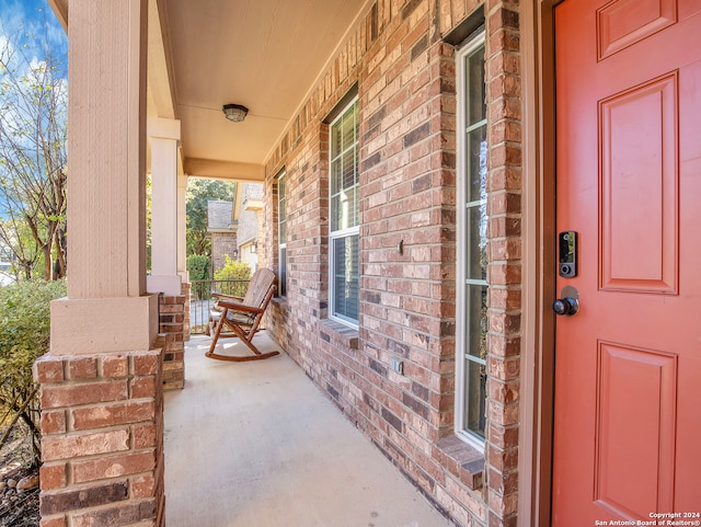 property entrance featuring covered porch