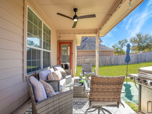 view of patio with outdoor lounge area and ceiling fan