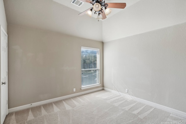 carpeted empty room featuring ceiling fan