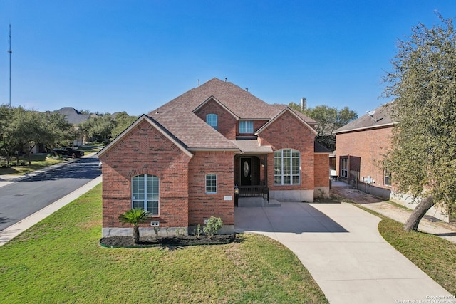 front facade with a front yard