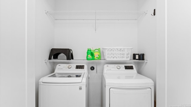 laundry area featuring independent washer and dryer