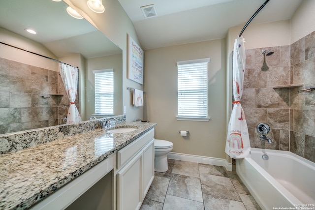 full bathroom featuring shower / tub combo, vanity, toilet, and lofted ceiling