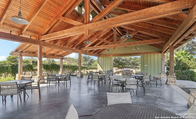 view of patio / terrace featuring a gazebo and ceiling fan