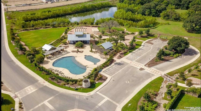 drone / aerial view featuring a water view