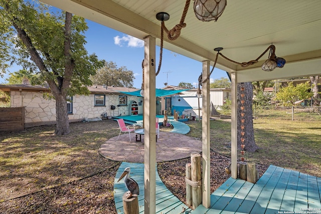 exterior space featuring a lawn and a patio