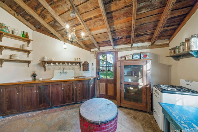 kitchen featuring white range with gas cooktop, dark brown cabinets, and vaulted ceiling with beams