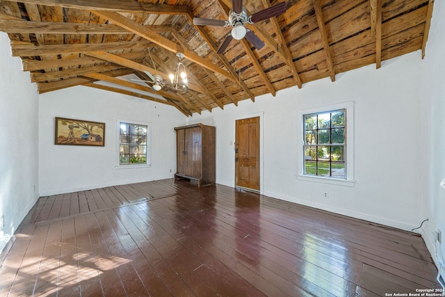 unfurnished living room featuring dark hardwood / wood-style floors, beam ceiling, ceiling fan with notable chandelier, and high vaulted ceiling