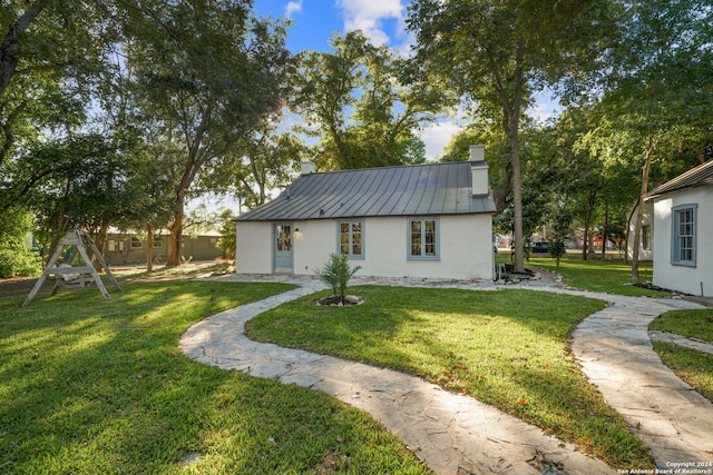 view of front of home with a front yard