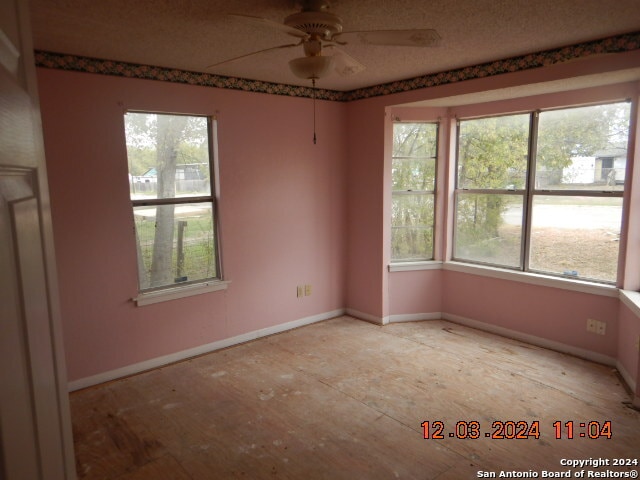 spare room featuring ceiling fan