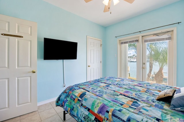 bedroom with ceiling fan, access to exterior, and light tile patterned floors