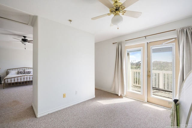 spare room with carpet floors and ceiling fan