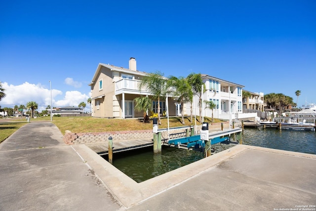 view of dock with a water view