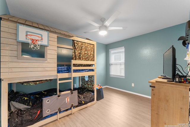 bedroom featuring ceiling fan and wood-type flooring