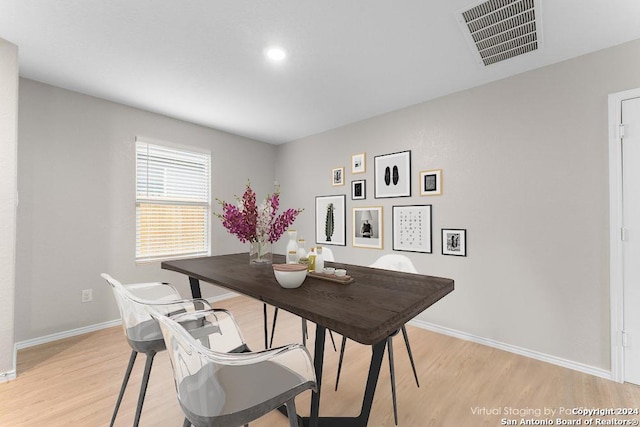 dining room featuring light hardwood / wood-style floors