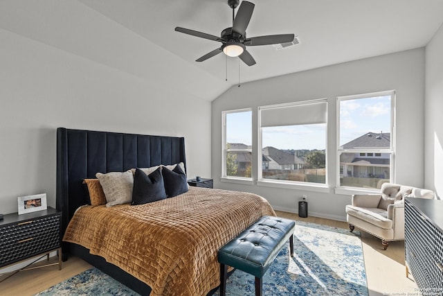 1521 Escarpment, New Braunfels, TX 78132 - bedroom with wood finished floors, a ceiling fan, and vaulted ceiling