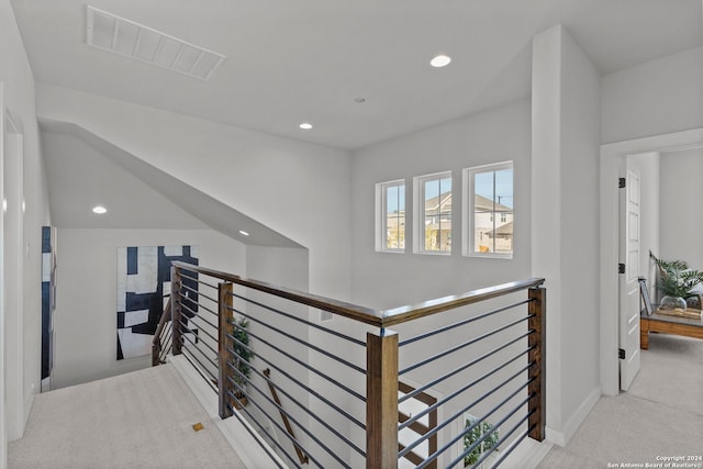 1521 Escarpment, New Braunfels, TX 78132 - hallway featuring an upstairs landing, carpet flooring, recessed lighting, and baseboards