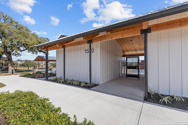 1521 Escarpment, New Braunfels, TX 78132 - property entrance with board and batten siding