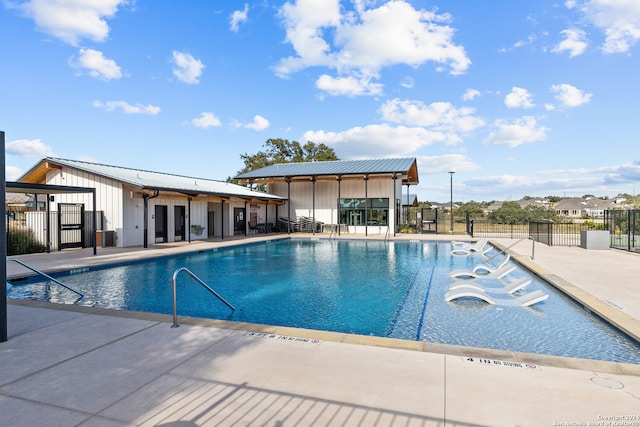 view of swimming pool featuring a patio