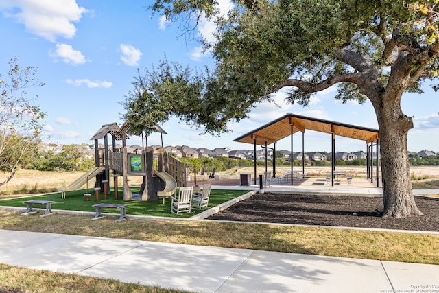 view of jungle gym with a yard