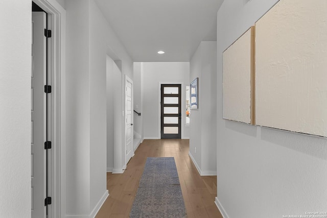 1521 Escarpment, New Braunfels, TX 78132 - entryway with wood finished floors, baseboards, and recessed lighting