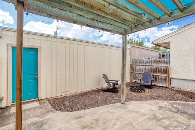 view of patio / terrace featuring a fire pit