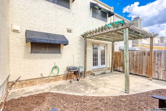 view of patio with a pergola and grilling area