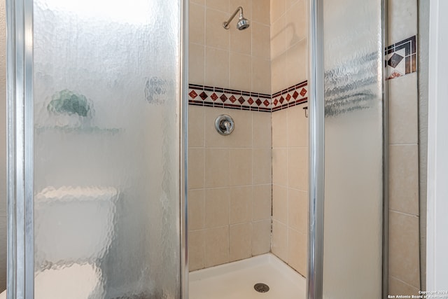 bathroom featuring walk in shower