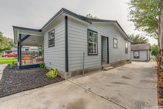 view of home's exterior featuring a porch