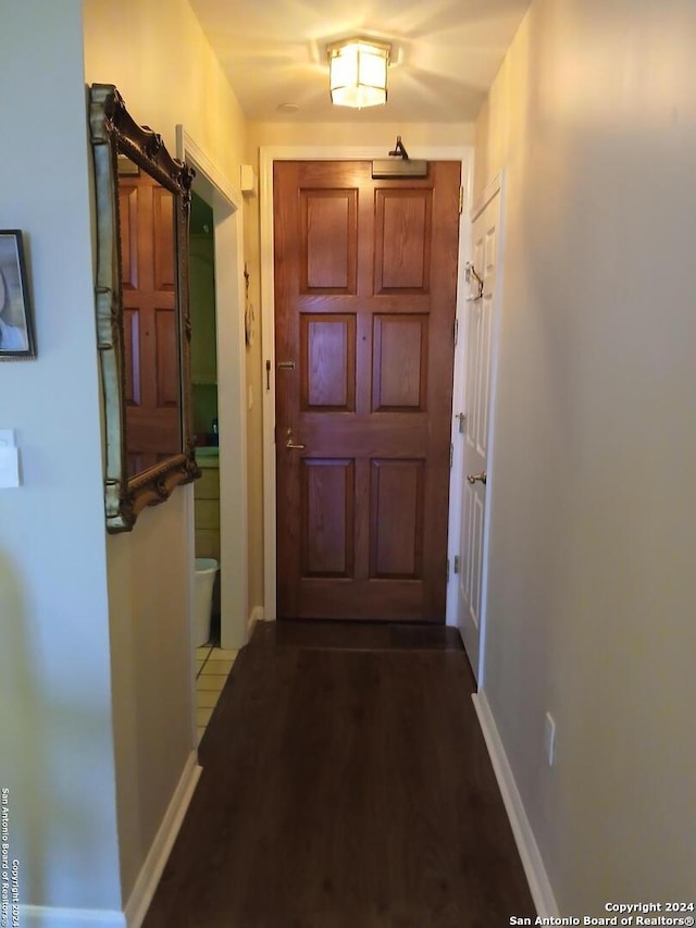 doorway to outside with hardwood / wood-style flooring