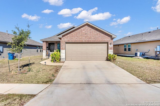 view of front of home with a front yard, central AC, and a garage