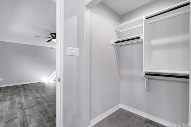 spacious closet featuring ceiling fan and hardwood / wood-style floors