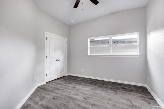 unfurnished room with ceiling fan and light hardwood / wood-style flooring