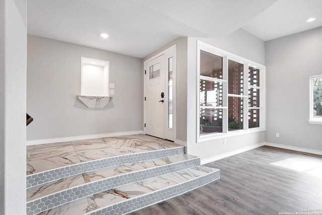 entrance foyer featuring hardwood / wood-style flooring