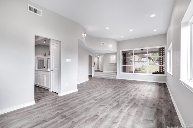 unfurnished living room with light hardwood / wood-style floors