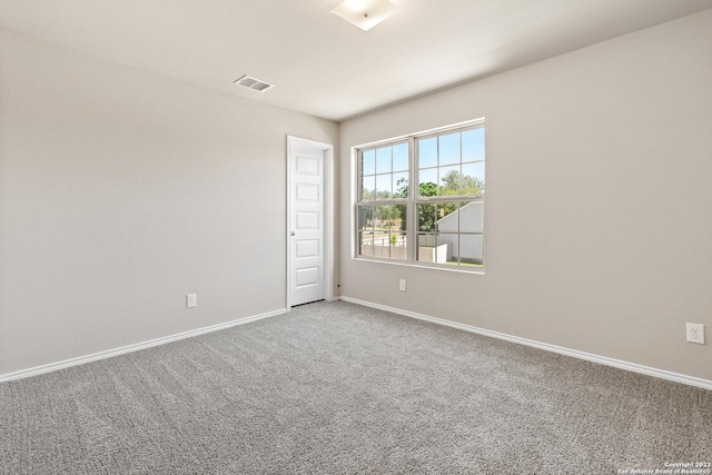 view of carpeted spare room