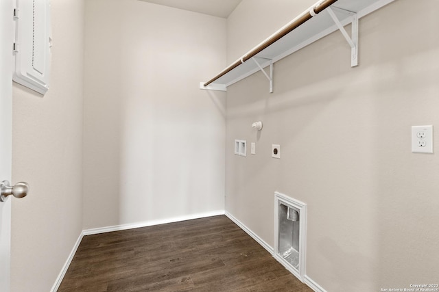 laundry room featuring hookup for an electric dryer, hookup for a gas dryer, dark hardwood / wood-style flooring, and hookup for a washing machine