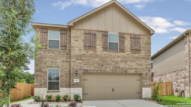 view of front of property featuring a garage