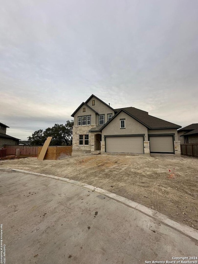 view of front of property featuring a garage