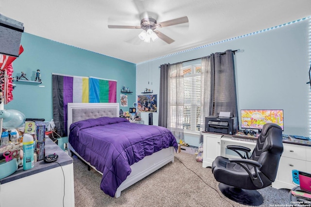 carpeted bedroom featuring ceiling fan