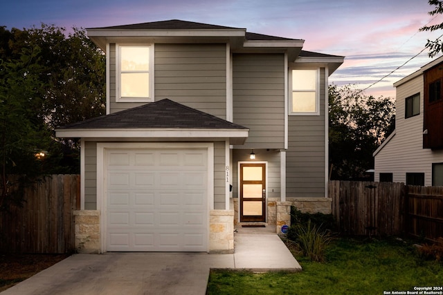 view of front of property featuring a garage