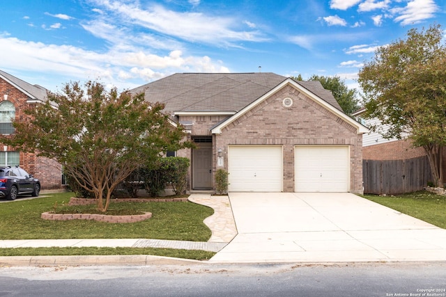 10406 Canyon Riv, Helotes, TX 78023 - view of front facade featuring fence, a front lawn, brick siding, a garage, and driveway