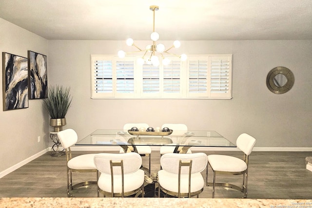 dining area with a notable chandelier and dark wood-type flooring