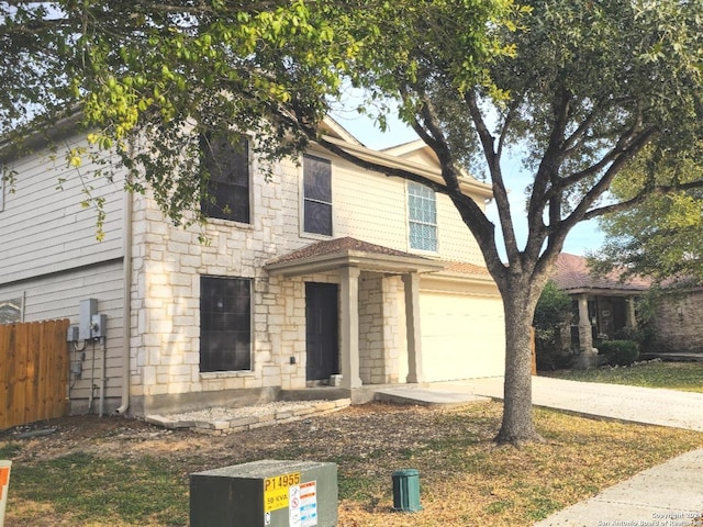 view of front of property featuring a garage