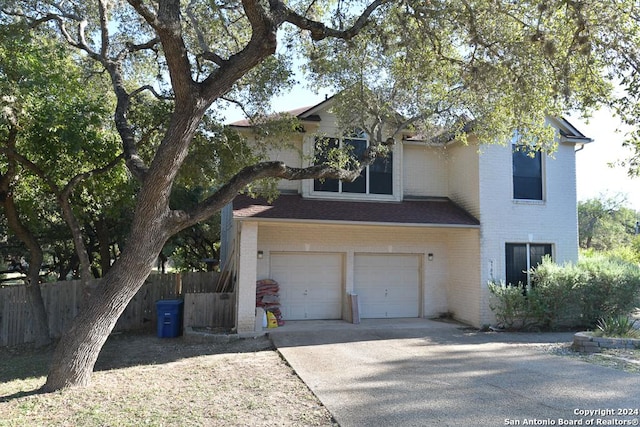 view of front of property featuring a garage