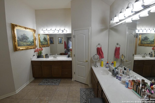 bathroom with tile patterned floors and vanity